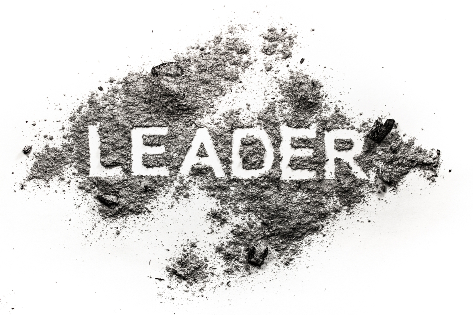 Leader word written in ash, dirt or dust